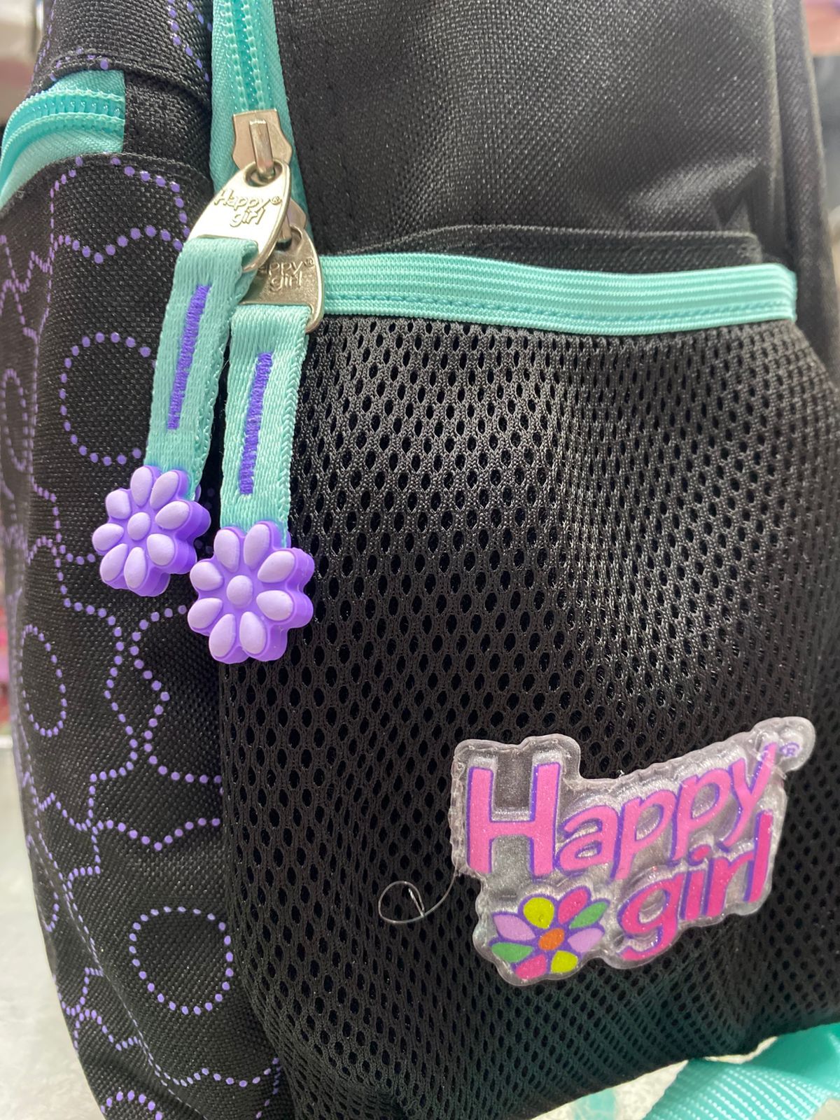 Mochila primaria flores negra chenson