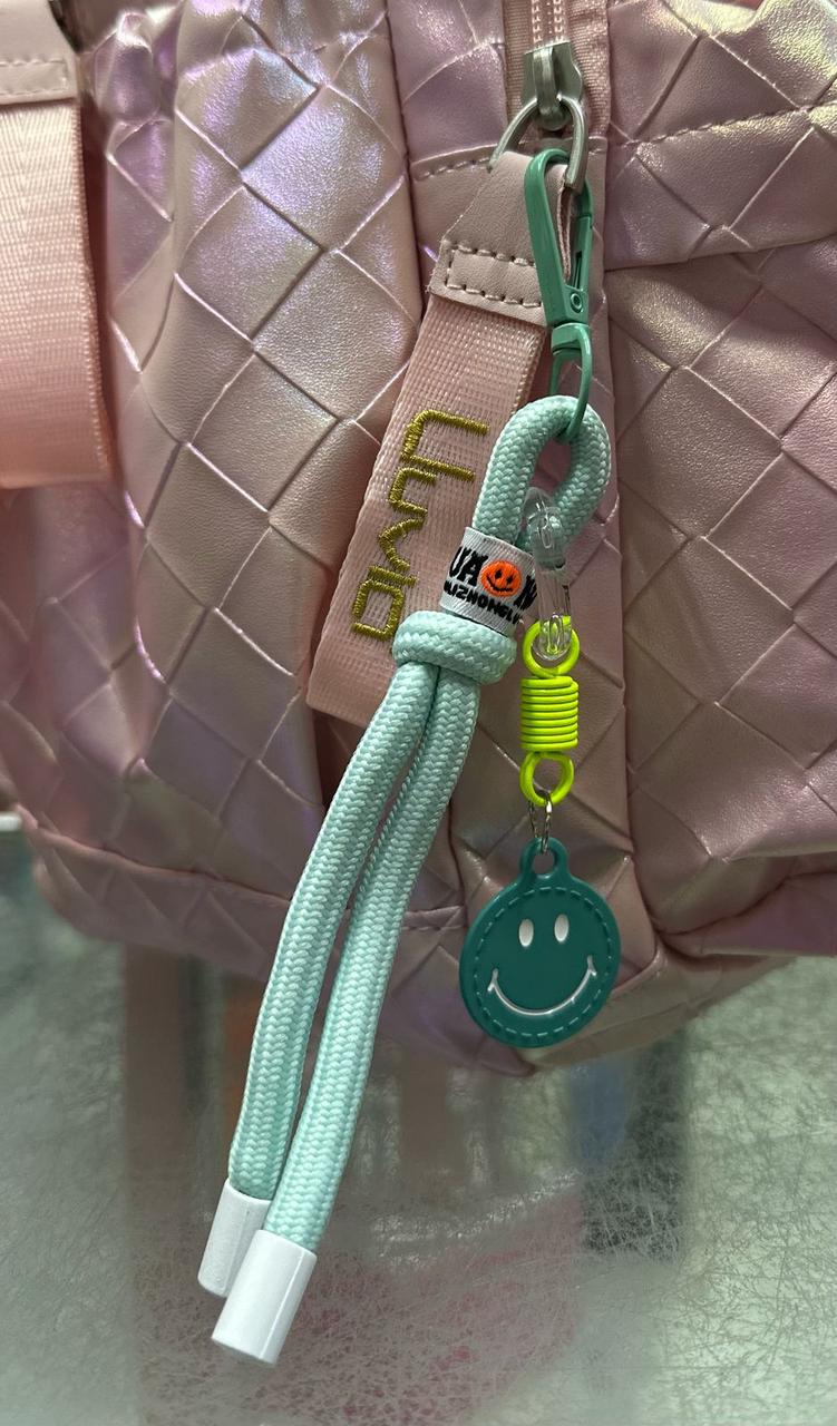 Mochila primaria rombos tornasol rosa lluvia