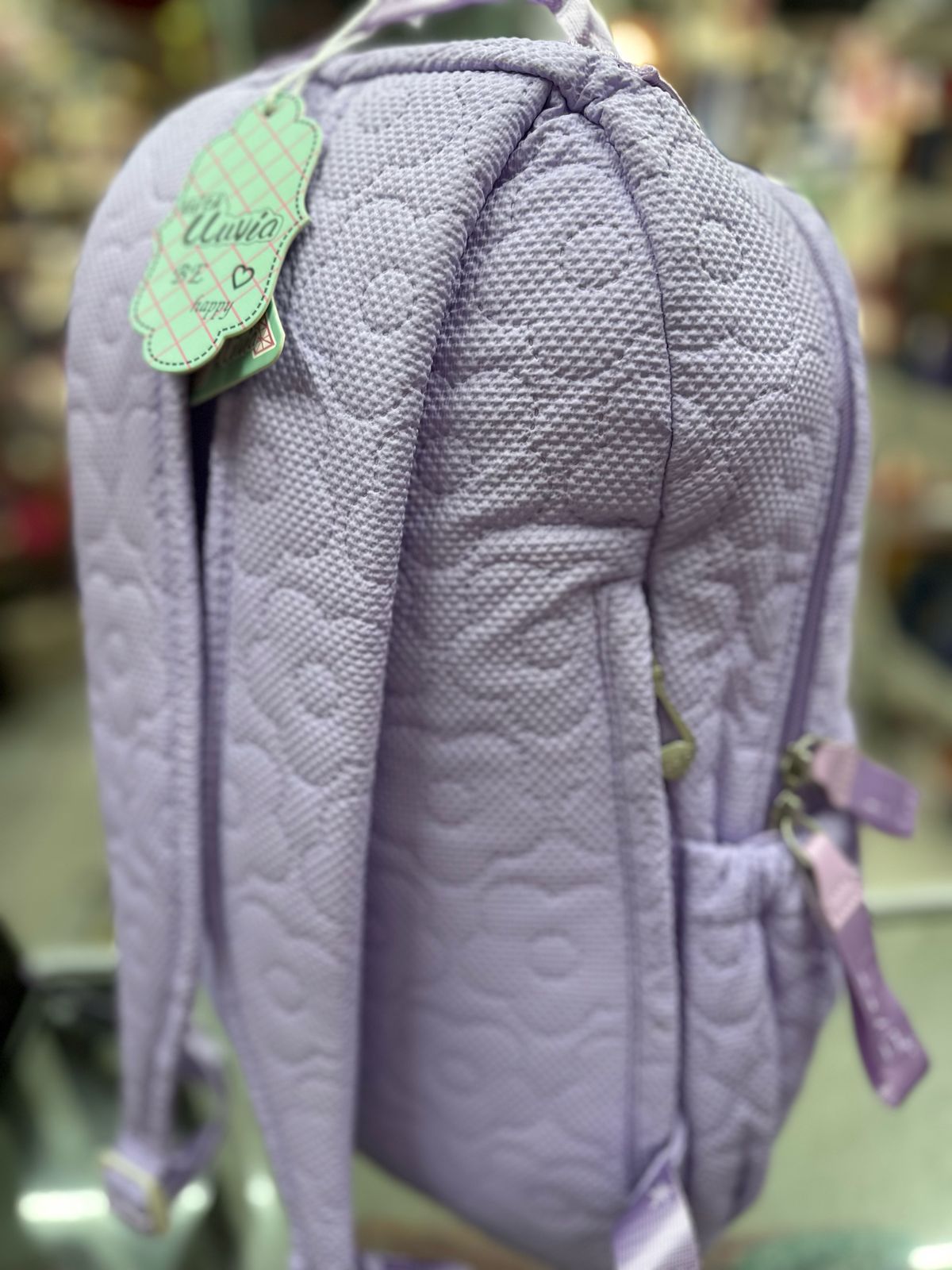 Mochila juvenil textura flores lila lluvia