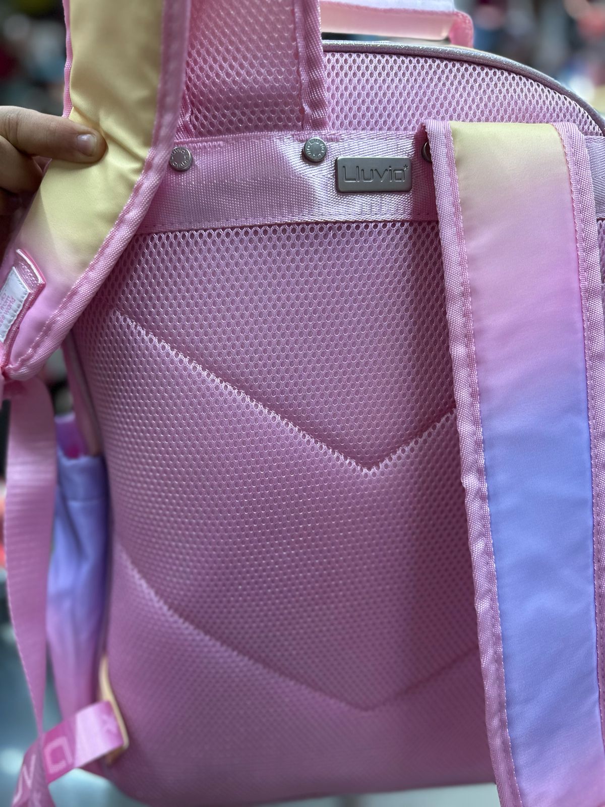 Mochila primaria arcoiris tornasol lluvia