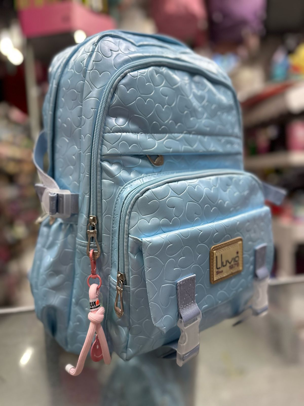 Mochila juvenil textura corazones azul lluvia