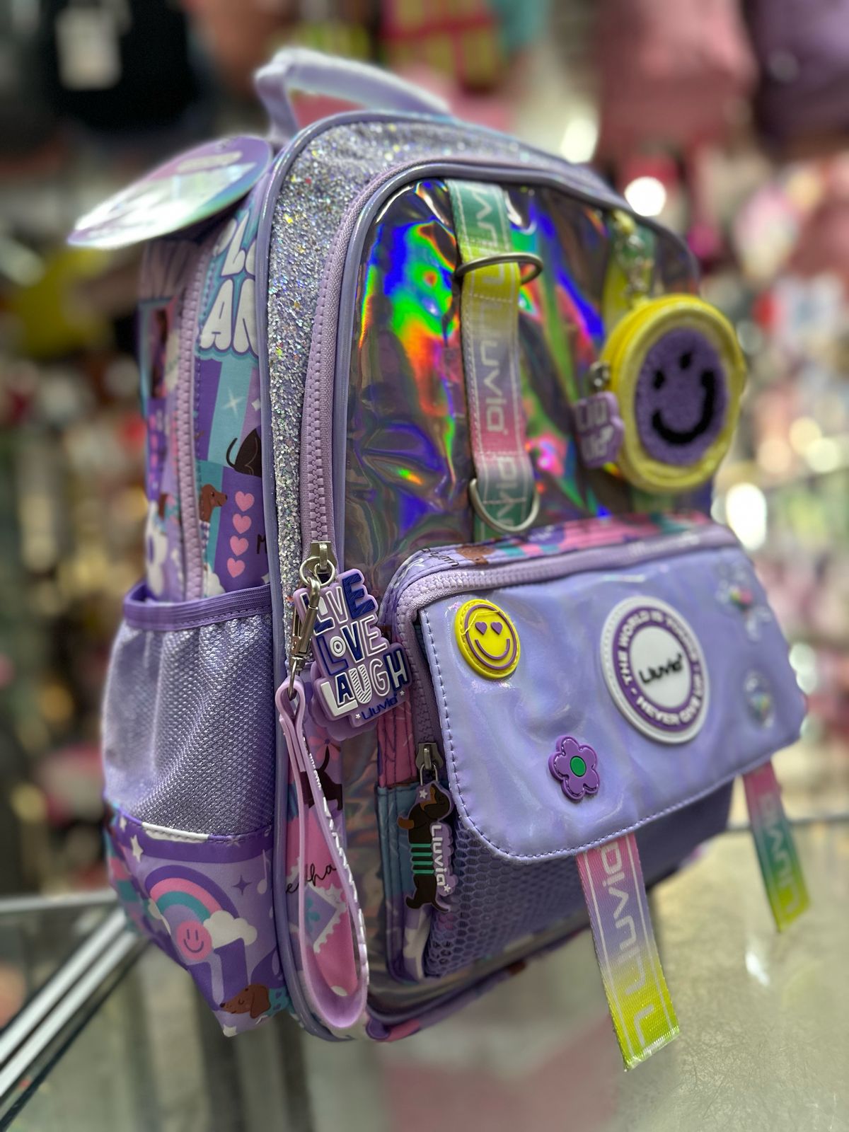 Mochila primaria stickers tornasol Lila lluvia