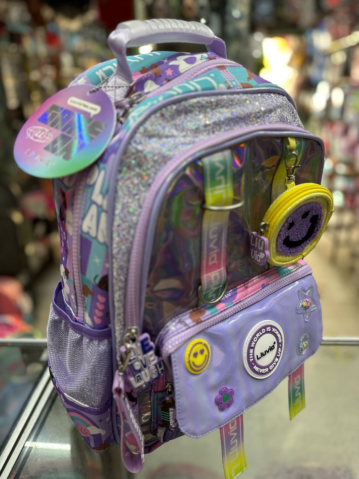 Mochila primaria stickers tornasol Lila lluvia
