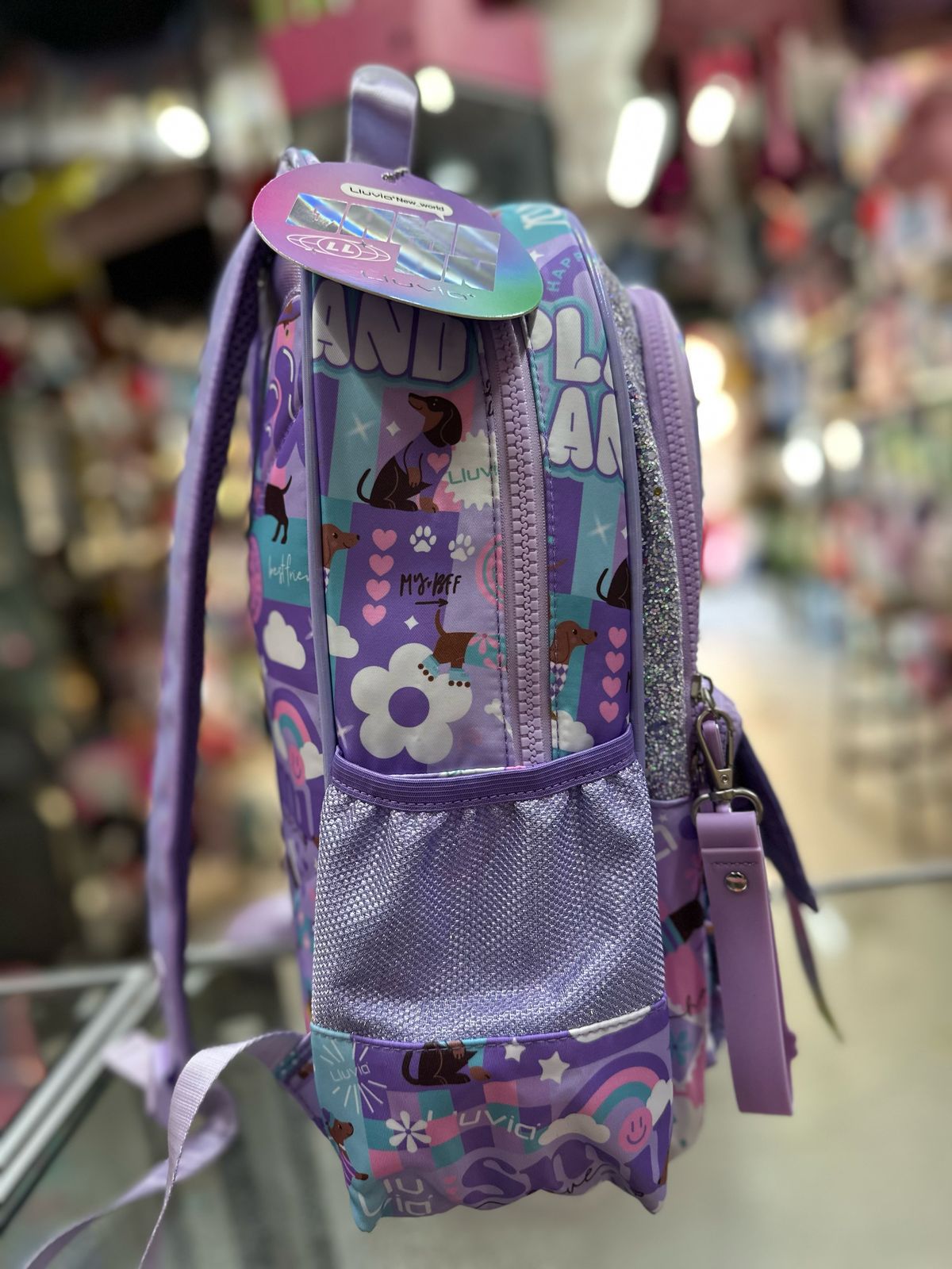 Mochila primaria stickers tornasol Lila lluvia