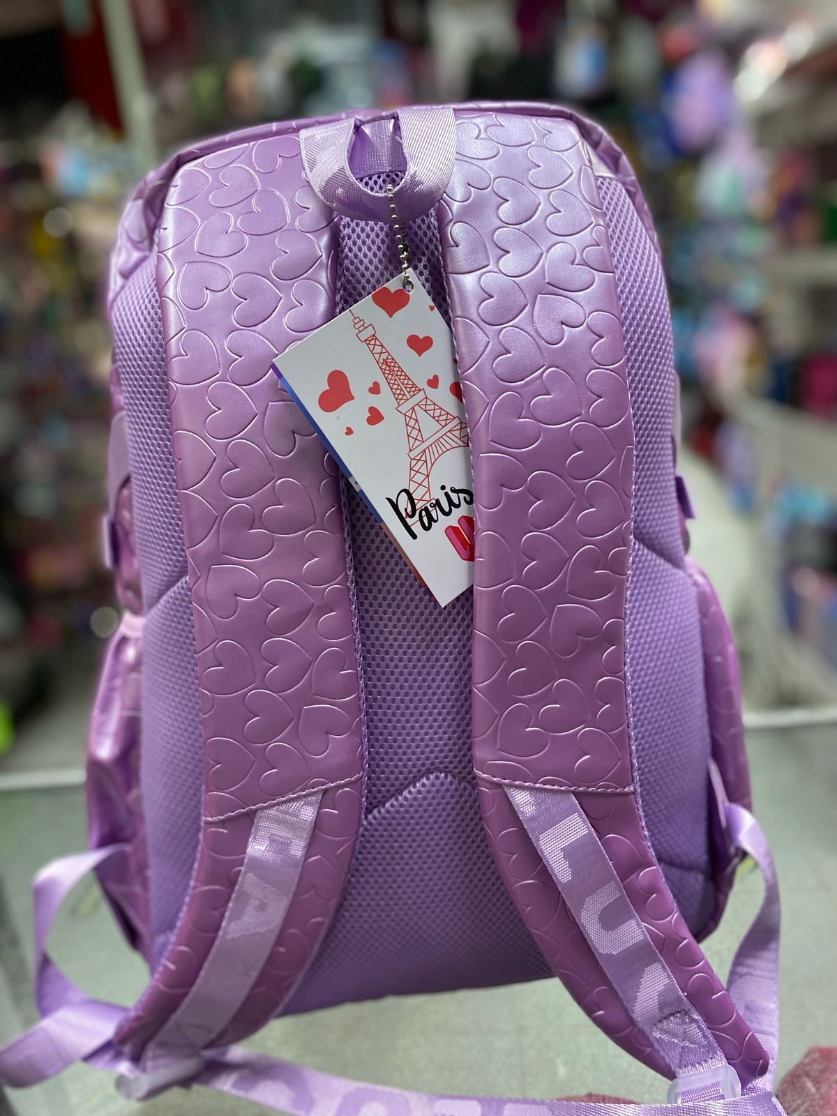Mochila juvenil textura corazones lluvia