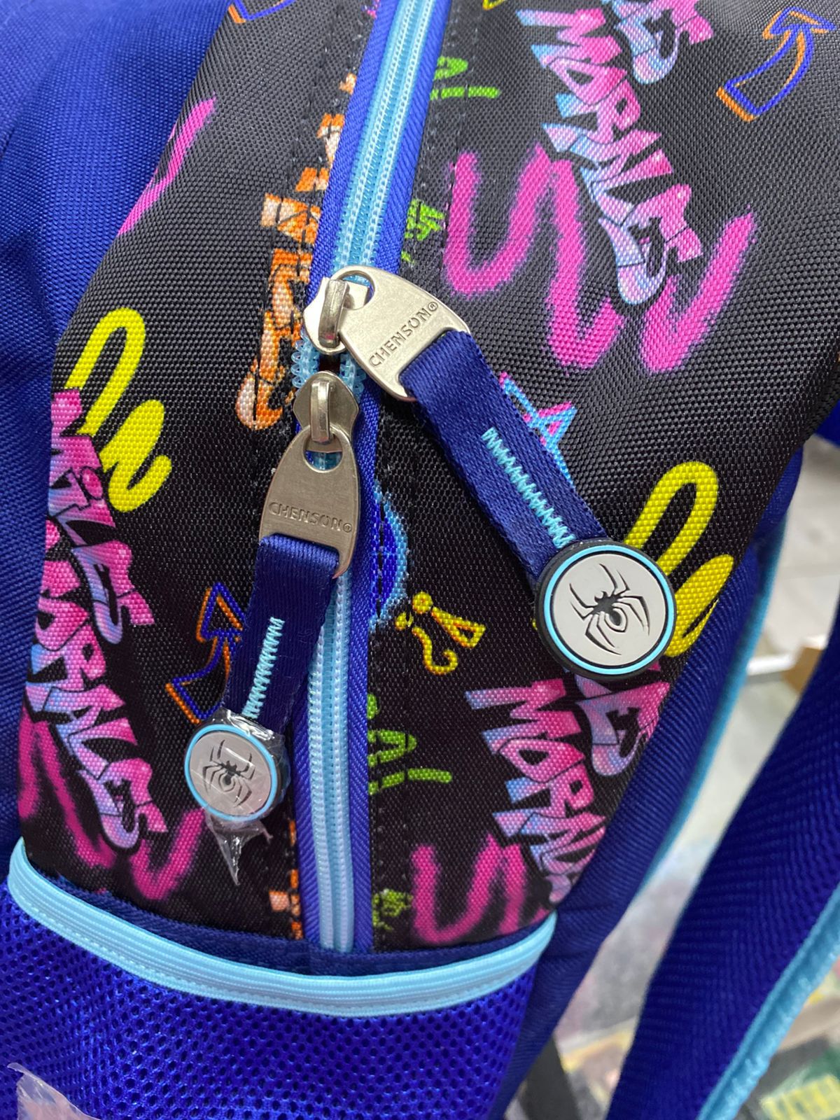 Mochila primaria Miles Morales ciudad azul Chenson