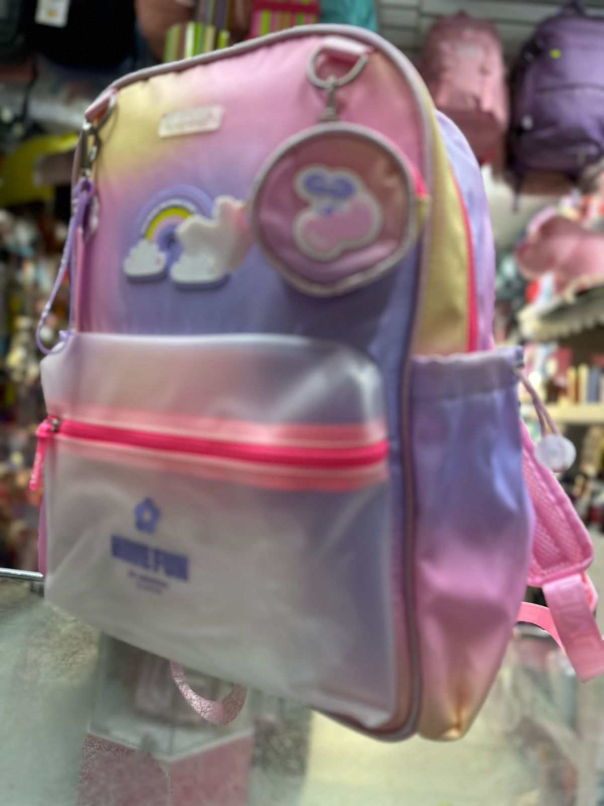 Mochila primaria arcoiris tornasol lluvia